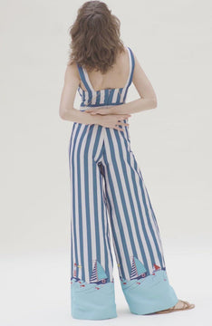 video showing Blue and white striped jumpsuit with nautical design at hem