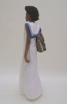 video of Macro flap bag in blue color with plastic chain straps