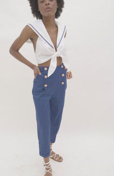 video of Navy cropped pants with crochet buttons