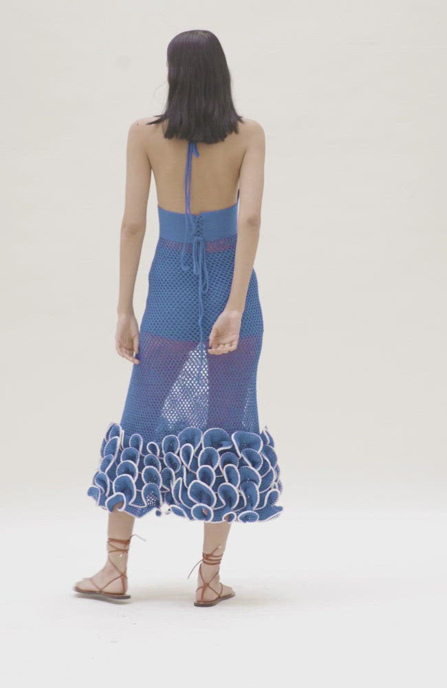 video of Blue crochet halter dress with ruffle detail at bottom hem