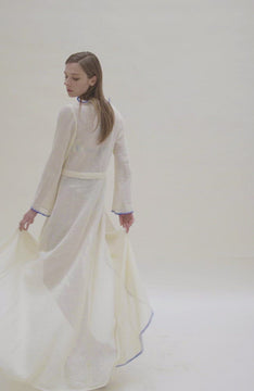 video of White cotton lace caftan with blue ruffle detail from all sides