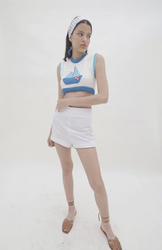 video of White shorts with side zip and blue piping